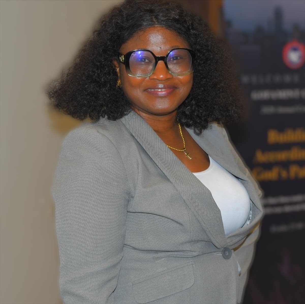 Ms. Obadaki in a grey blazer at the Gofamint Canada convention